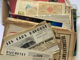 a box full of old newspapers sitting on top of a table