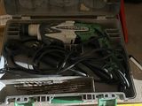 a tool box with tools in it sitting on the floor