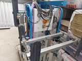 a picture of a forklift with a pallet attached to it