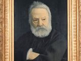 portrait of a man with a white beard in a gold frame
