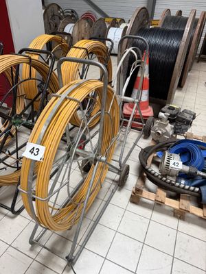 a lot of different types of wires on the floor