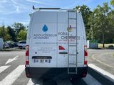 a van that is parked on the side of the road