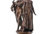 an image of a bronze statue of a man and a woman on a marble base