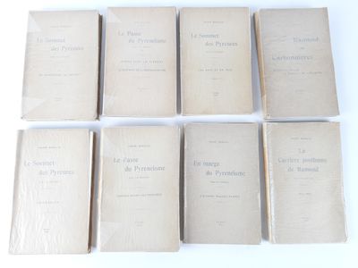 six books are stacked on top of each other on a white surface
