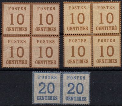 a close up of a group of stamps with numbers on them