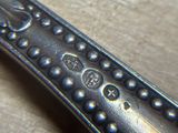 a close up of a metal object on a table