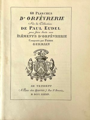 an old book with a picture of a coat of arms on it