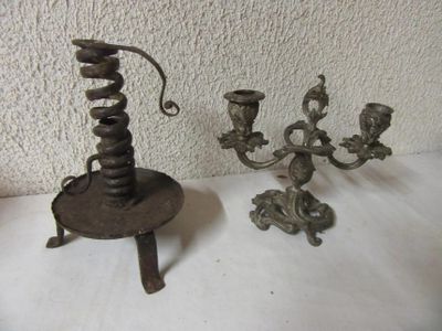 two candles that are sitting on a table