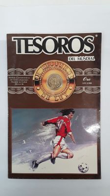 un livre sur lequel figure la photo d'un footballeur