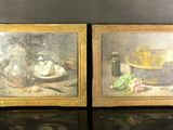 une paire de tableaux représentant une nature morte avec une corbeille de fruits et une bouteille de vin