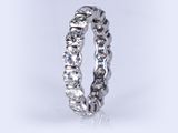 a close up view of a diamond eternity ring