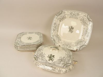 four plates and a bowl sitting on a table
