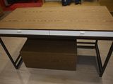 an image of a desk with a drawer underneath it