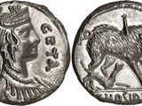 a silver coin with an image of a woman and a horse on it