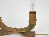 a light that is sitting on a wooden stand