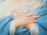 a picture of a painting of a woman holding her hands together