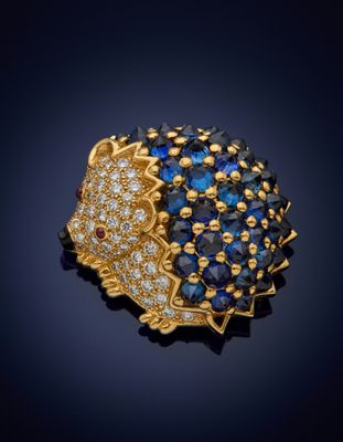 a sapphire and diamond hedge broochle, by van cleef