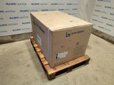 the box is sitting on a pallet in front of a wall