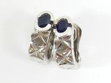 pair of silver and blue sapphire earrings on white background