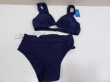 a bathing suit and panties on a white table
