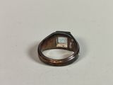 an image of a close up of a ring on a table