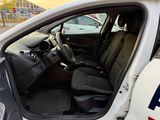 a police car with its door open in the parking lot