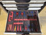many different tools in a tool box on the floor