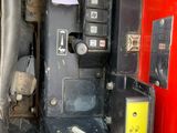 a picture of the inside of a vehicle with the door open