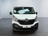the front of a white van parked in a white room