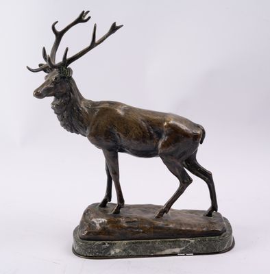 bronze sculpture of a stag on a marble base
