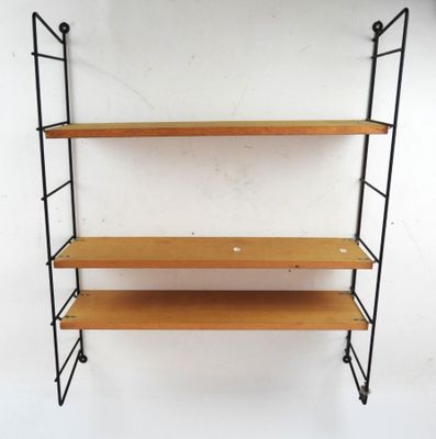 an image of a shelf with three shelves on it