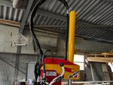 a picture of a red and yellow machine in a building