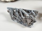 a close up of a piece of metal on a table