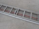 a ladder that is laying on the ground