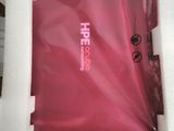a pink bag in a white box on a table