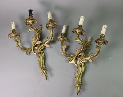 pair of antique wall sconces with gold leaf and candle holders