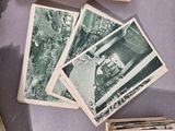 many old photos of people in the woods on the table