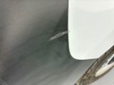 a close up of a car ' s side mirror on the side of the car