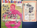 two posters on the wall of a building with a man holding a baseball bat