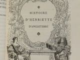 an open book with a picture of a man and a woman sitting on a bench