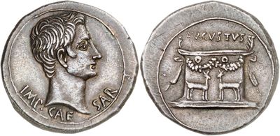 a silver coin with an image of a woman and a horse on it