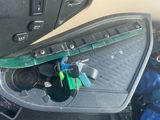 a close up of a car door handle with a bunch of keys