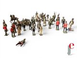 de nombreuses figurines de soldats posées sur une surface blanche
