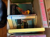 a box full of books sitting on the floor