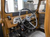 a steering wheel and dashboard of an old car