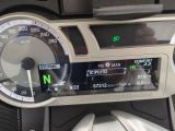 a close up of a car dashboard with a speedometer