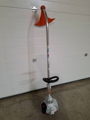 une photo d'une scie à perche dans un garage