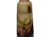 a vase with a flower on it on a white background