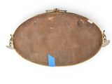 a picture of a mirror with a blue tape on it