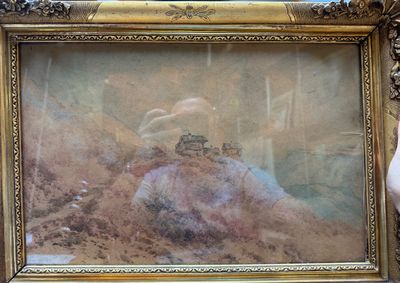 a picture of a woman sitting in a chair holding a picture